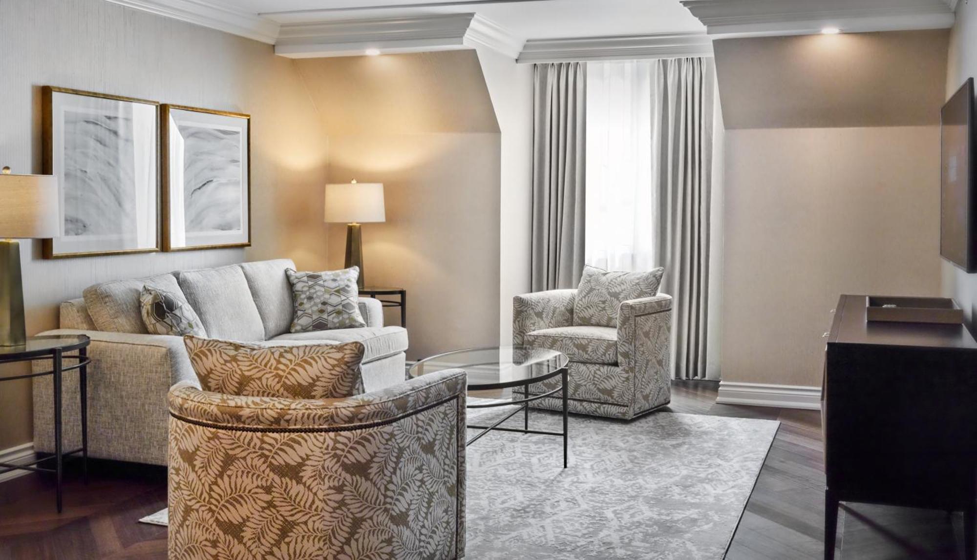 Chateau Vaudreuil Екстер'єр фото A living room at the Ritz-Carlton, Boston